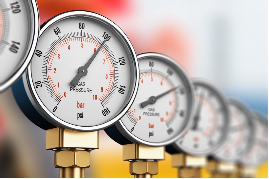 A close-up of a row of pressure gauges