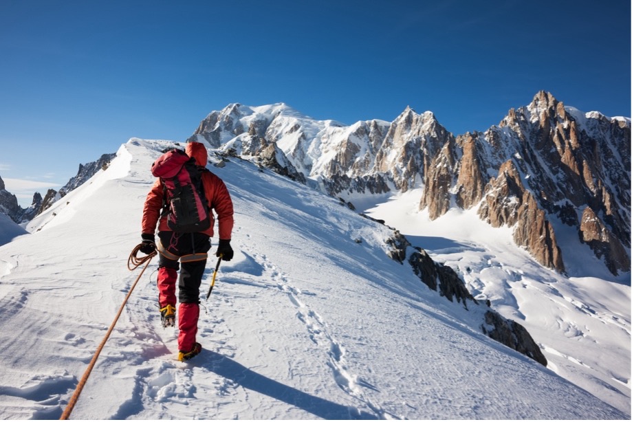 A person hiking on a snowy mountain