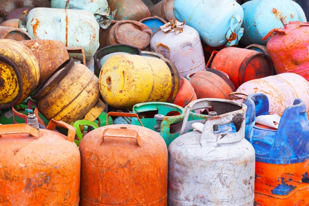 Rusty Cylinders in landfill